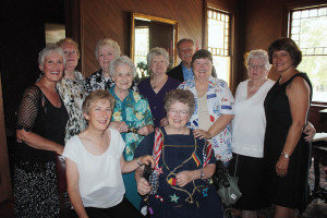 Seated L-R) Judith Pattinson; Pinky (Joan) Glass; (Standing L-R) Mariann Stratton, former director, Navy Nurse Corps; Syble Horn; Dottie Leonard; Betty Nagy; Elayne Stewart; Tom Nunns; Anne Marie Nelson; Joan Tulich; and Sandra Peppard share a photo at the Brackenridge Villa on June 26, 2012. All but Horn and Stewart are retired Navy Nurses. Donoghue’s friends congregated at the Brackenridge Villa following her memorial services.