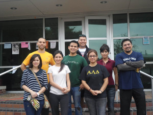 Lucke (pictured top left) shares a photo with UIW student volunteers on Dec. 1, 2012 during a Saturday Morning Wellness/Garden Volunteer Workday. Students can earn community service hours by participating in the workdays.