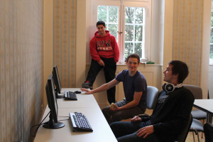 (Pictured L to R) Brody Rodriguez, David Craig and Evan Morris share a laugh in the ESC computer lab.