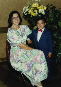 Vasquez pictured with his pre-kindergarten teacher,Terri Harrold ’75 BA, at St. Peter Prince of Apostles School.