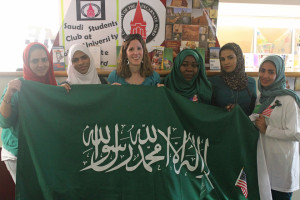  Amy DeStefano, international admissions counselor, shares a photo with members of the Saudi Student Club at the Saudi Arabia National Day event at Marian Hall Student Center on Sept. 23.