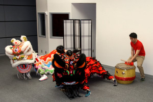 Team members practice the lion dance in the ICC Auditorium. 