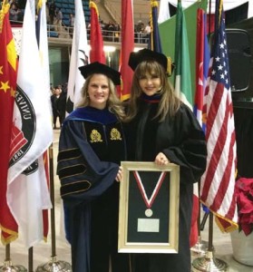 Alumna of Distinction for Professional Achievement Dr. Patsy Torres (right) poses with Director of Alumni and Parent Relations Dr. Lisa McNary following the fall commencement ceremony.  