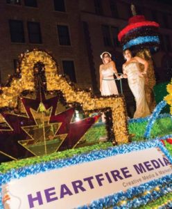 Duran and Najera aboard their float at the Fiesta Flambeau Parade.