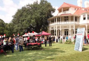 Employees attend this year’s kickoff in front of the Brackenridge Villa. 