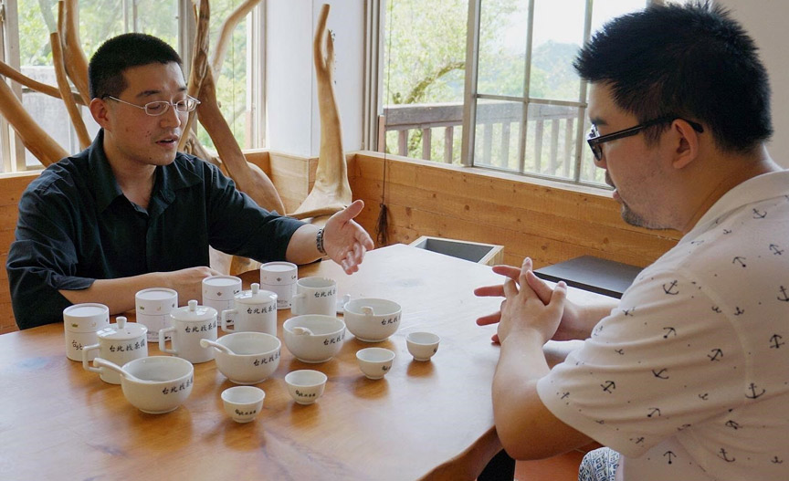 Billy Lee studying the art of tea brewing. Photo courtesy of Brew's Lee.