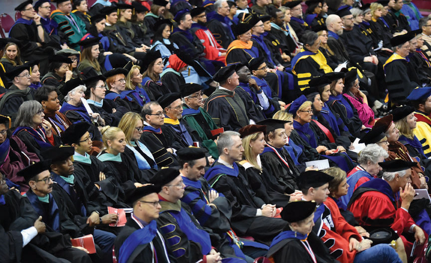 Faculty members, deans and visiting presidents attend the inauguration.