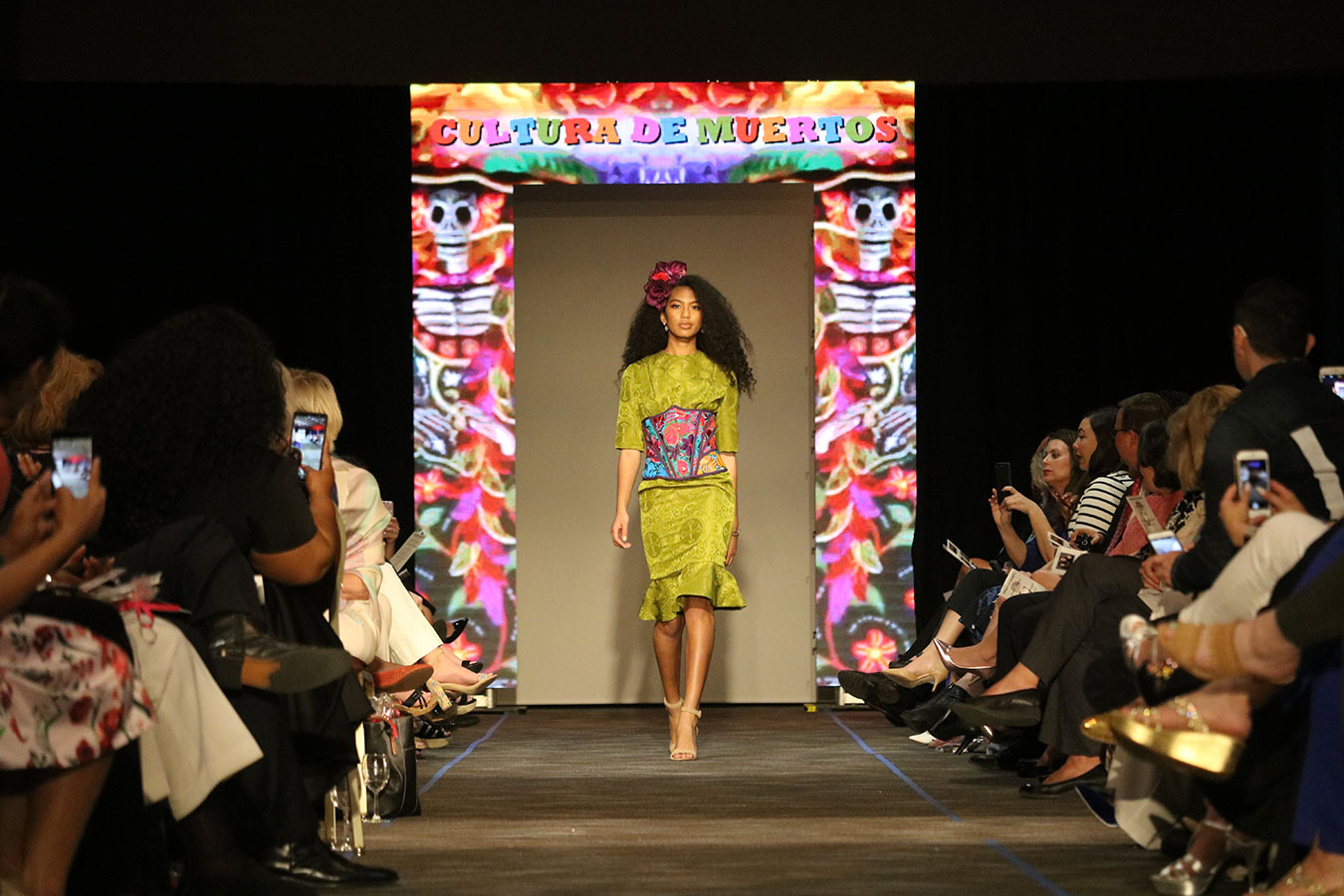 model walks the runway at the Cutting Edge Fiesta Fashion Show